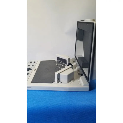 White plastic audioscan verifit vf-1 hearing analyzer with hinged screen and control panel for real-ear testing
