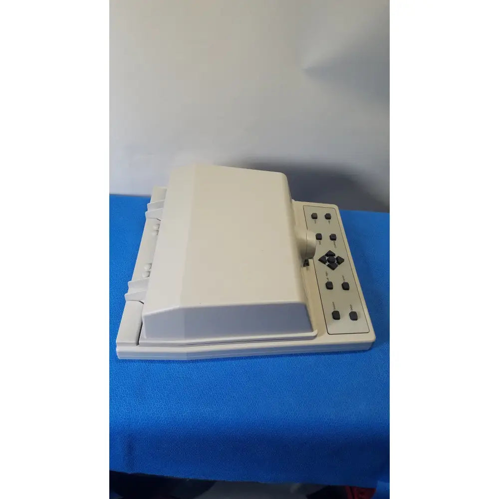 Beige plastic audioscan verifit vf-1 hearing analyzer with rectangular control panel and black buttons including directional pad