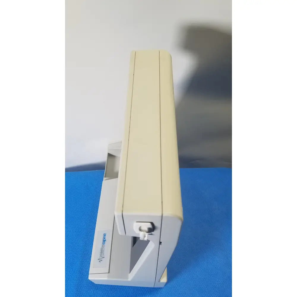 Beige plastic audioscan verifit vf-1 real-ear hearing analyzer with white latch and gray accents for precise ear analysis