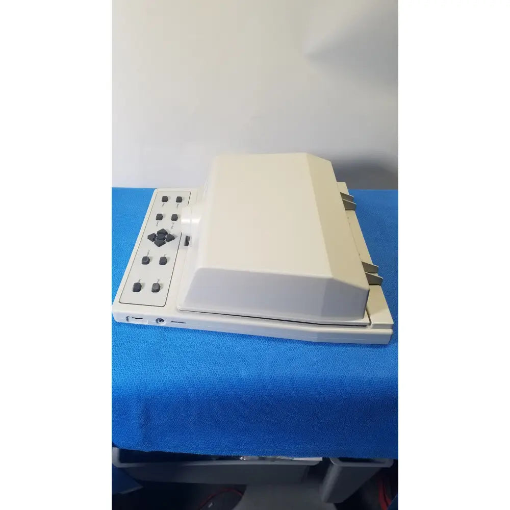 Cream-colored plastic audioscan verifit vf-1 hearing analyzer with rectangular control panel and integrated display