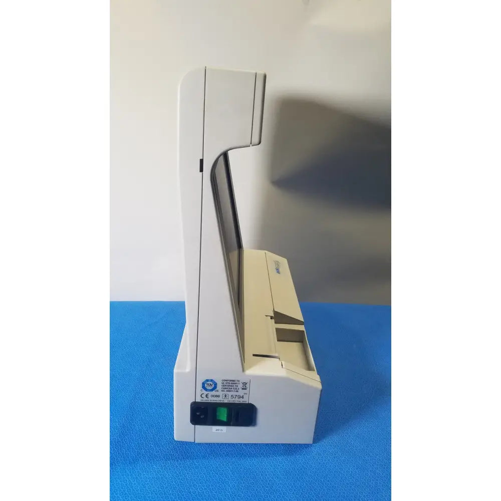 White plastic receipt printer with beige paper tray and green power button for audioscan verifit vf-1 hearing analyzer
