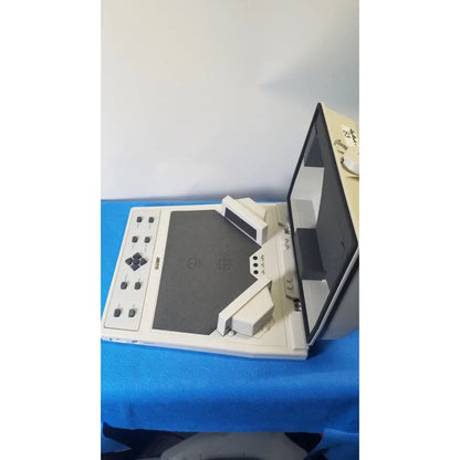 White Sony Walkman portable DVD player with flip-up screen and control panel used with Audioscan Verifit VF-1 hearing analyzer
