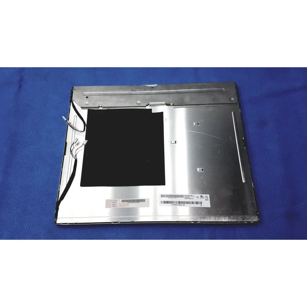 Silver-framed auo m170eg01 17 inch lcd display screen panel with black screen and visible internal wiring on back side