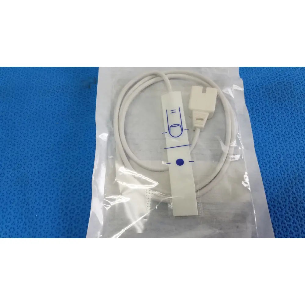 Authentic medical suresensor disposable white ecg lead with coiled cable and plastic connector in clear plastic packaging