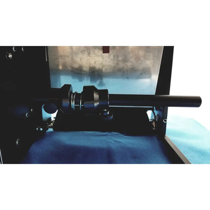 Black cylindrical metallic component of autobag pacesetter bagger sealer machine for precision bag sealing