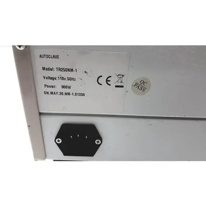 Silver autoclave portable steal sterelizer with black power input port and white label model tr250nm-1 back side view