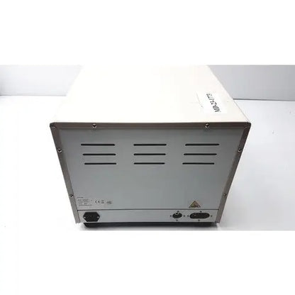 White and silver metal portable steal sterelizer packing tr250nm-1 autoclave portable steal back side view with ventilation slits