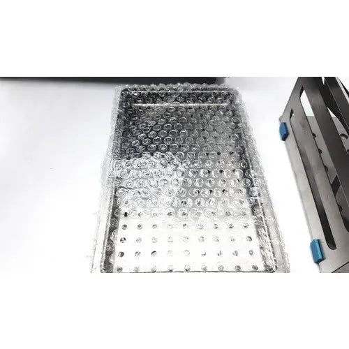 Rectangular autoclave portable steal tray with textured surface and raised bumps for portable steal sterelizer packing tr250nm-1