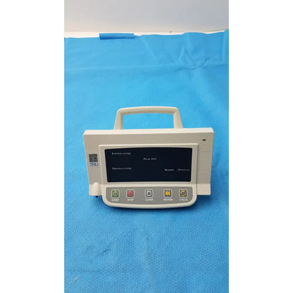 White plastic automatic blood pressure monitor infusion pump with black digital display and labeled buttons