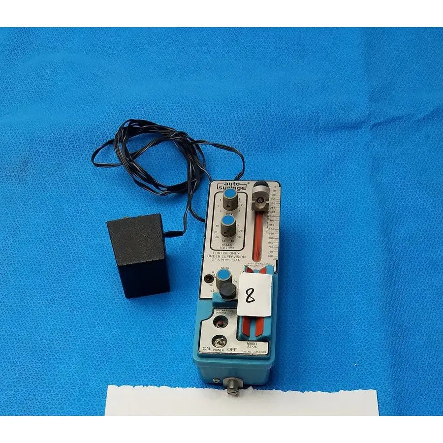 Light blue automatic dispensing module with silver knobs red dial and black cables for precise automatic dispensing