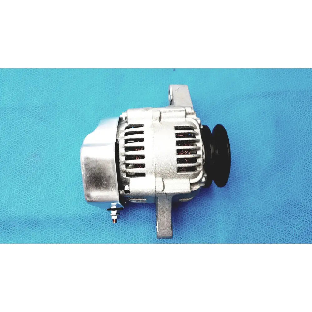 Silver aluminum automotive alternator with black pulley and cooling fins for reuse medical and spare applications