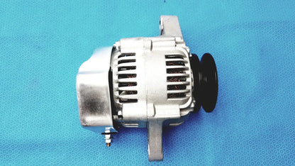 Silver aluminum automotive alternator with black pulley and cooling fins for reuse medical and spare applications