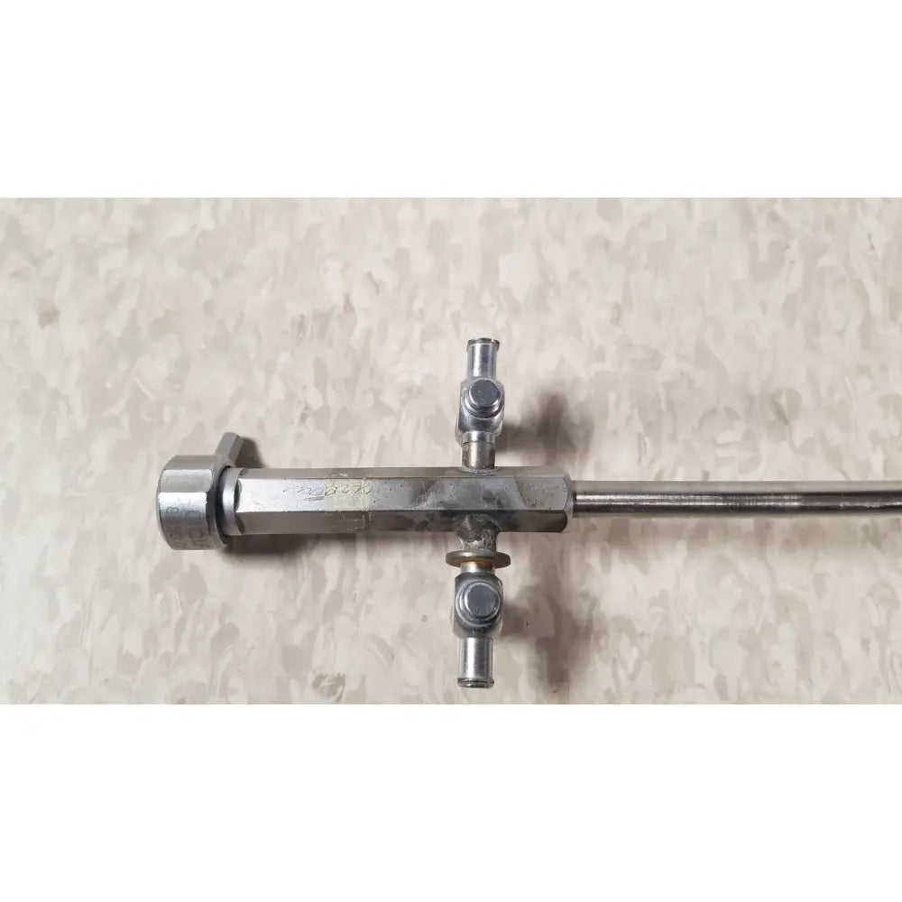 Silver metallic bainha externa richard wolf 8853.05 surgical instrument with hexagonal body and three threaded ports