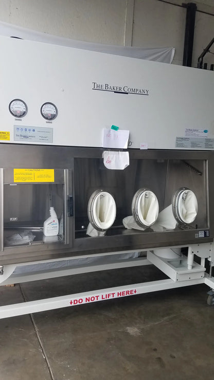White stainless steel baker ss-600 sterilshield positive pressure isolator with glass front and three circular glove ports