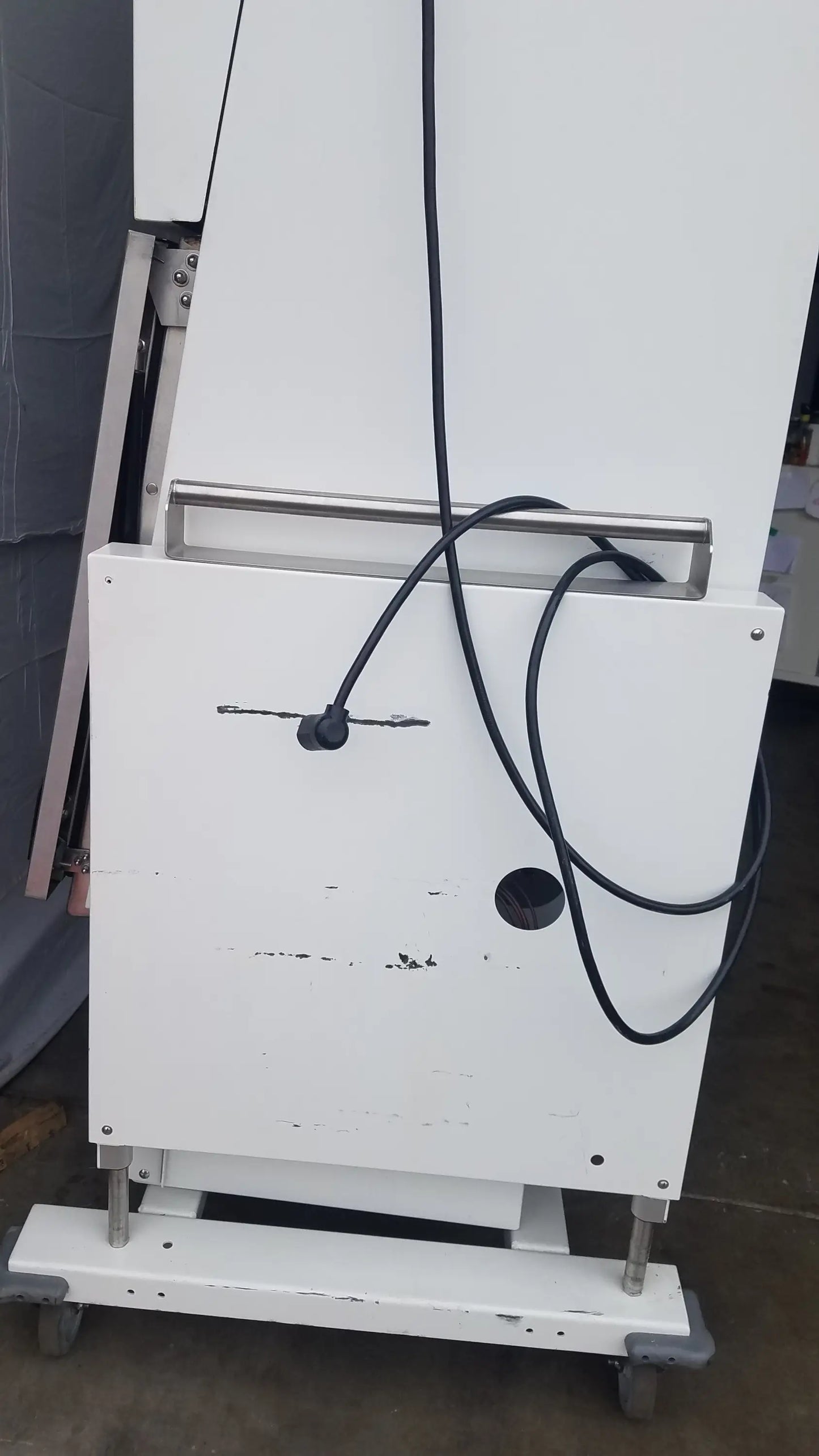 White Baker SS-600 sterilshield positive pressure isolator with metallic handle and black cables for controlled environments