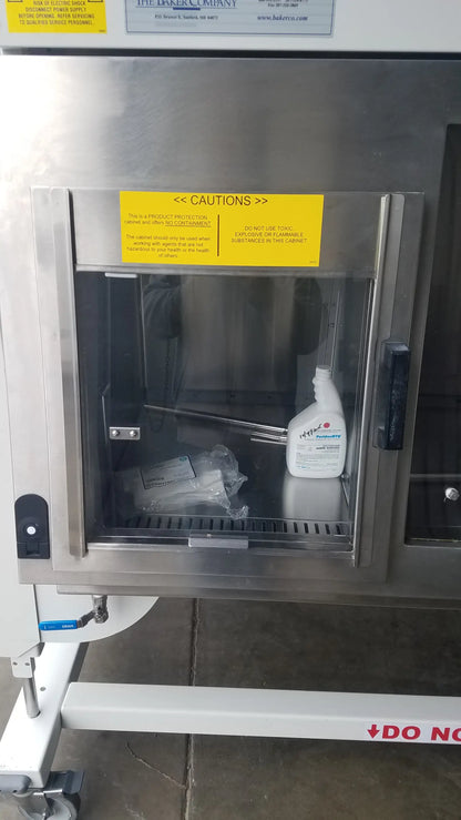 Stainless steel baker ss-600 sterilshield positive pressure isolator with transparent glass door and yellow caution label