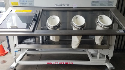 Baker SS-600 Sterilshield stainless steel positive pressure isolator with three white sterile containers inside