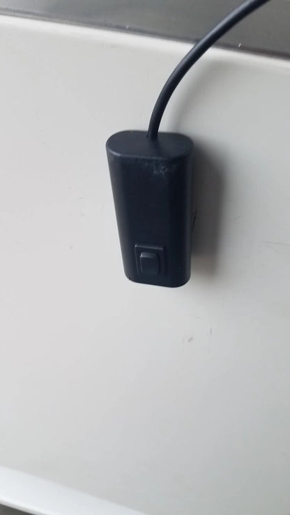 Black rectangular power adapter with single button for baker ss-600 sterilshield positive pressure isolator 115v pressure isolator