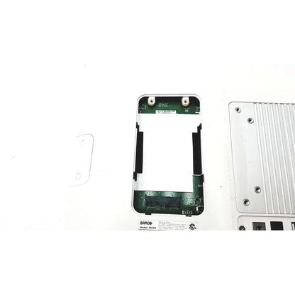Silver aluminum heat sink with vertical ridges and four mounting screws on the back of barco ja018 smart terminal bedside multi-touch
