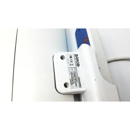White plastic barco ja018 smart terminal electronic component label showing model and serial number for bedside multi-touch use