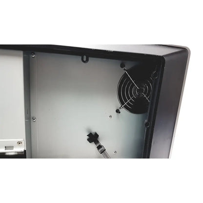 Black circular fan with protective grille inside open computer case of barco mdcc-6230 color led general radiology display
