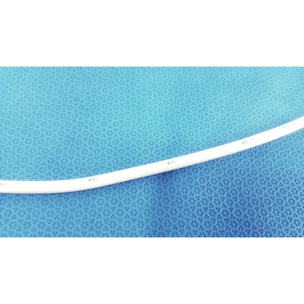 White plastic bard 21fr maloney tapered esophageal bougie with printed markings along its length