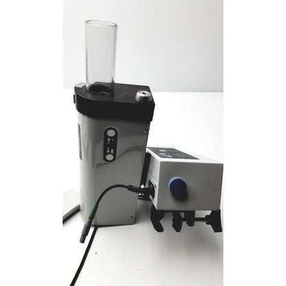 Silver and black bard peripheral flowmate injector crosser inj100 with clear glass cylinder and white power unit