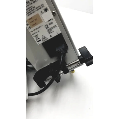 Black and silver bard peripheral flowmate industrial power supply unit with threaded knob and voltage specifications