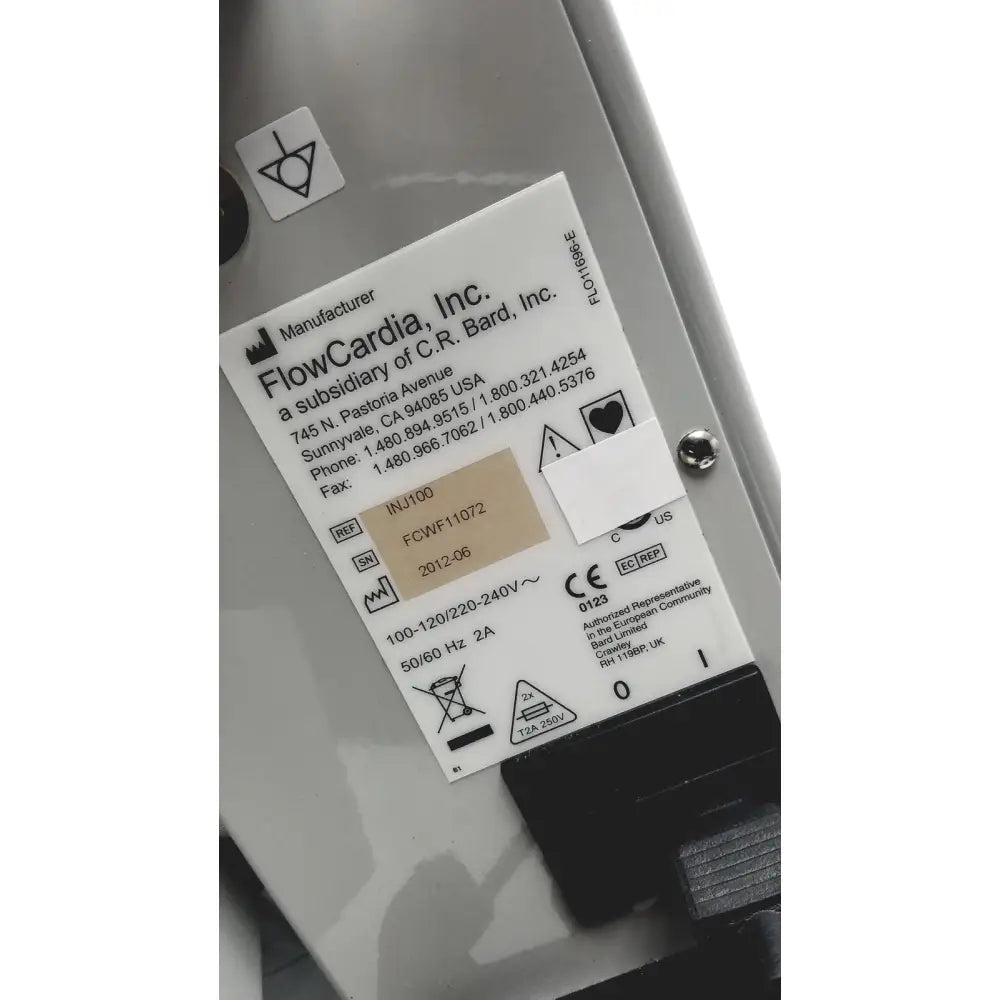 Silver metallic bard peripheral flowmate injector crosser medical device with black and white flowcardia inc label