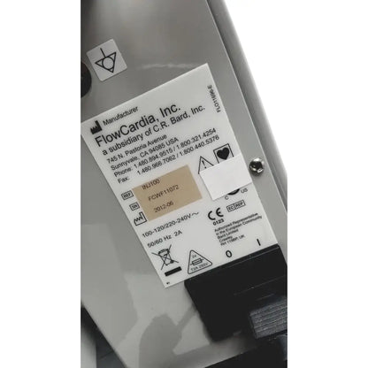 Silver metallic bard peripheral flowmate injector crosser medical device with black and white flowcardia inc label