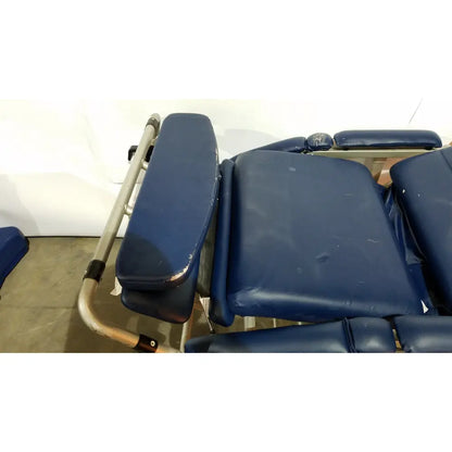Blue padded barton convertible medical chair with metal frame designed for versatile medical use