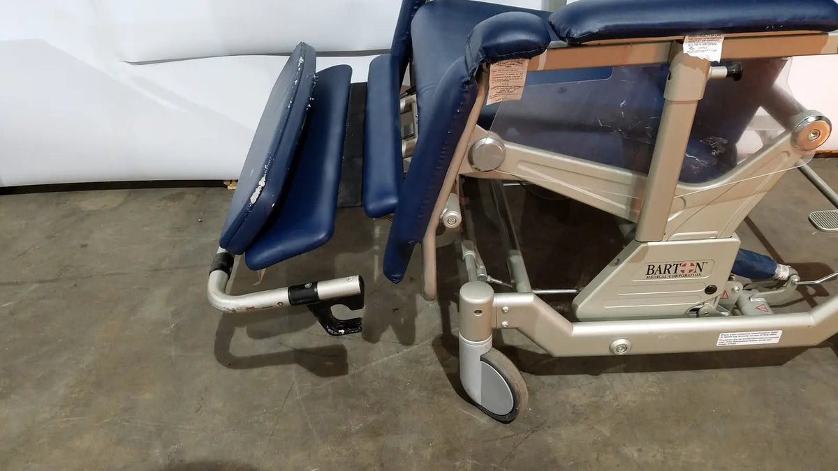 Blue upholstered barton convertible medical chair with silver metal frame and casters for medical examinations