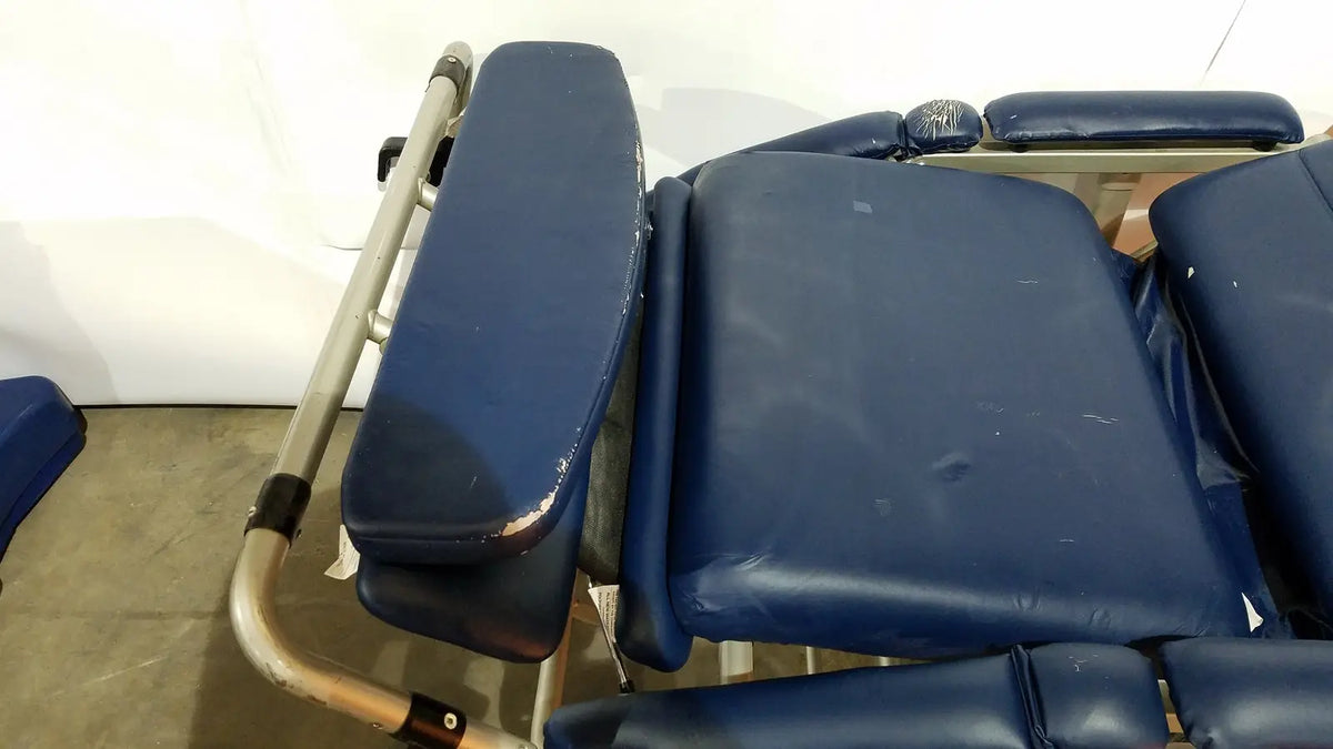 Blue padded barton convertible medical chair with metal frame designed for versatile medical use