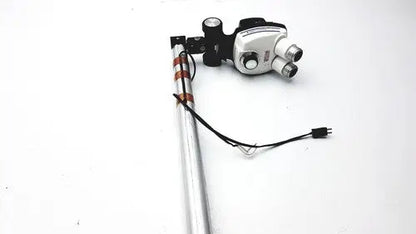 Silver and black Bausch and lomb stereozoom 4 microscope with dual eyepieces and zoom range 0.7X to 3.0X for reuse medical applications