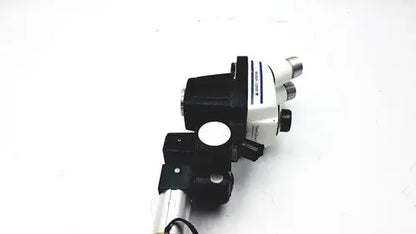 Black and white bausch lomb stereozoom 4 microscope with zoom range 0.7x to 3.0x and sturdy metallic base for reuse medical applications