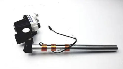 Silver cylindrical rod with copper coils and black wiring at the back of bausch and lomb stereozoom 4 microscope with zoom range 0.7x to 3.0x for reuse medical applications