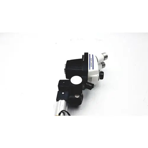 Black and white bausch lomb stereozoom 4 microscope with zoom range 0.7x to 3.0x and sturdy metallic base for reuse medical applications