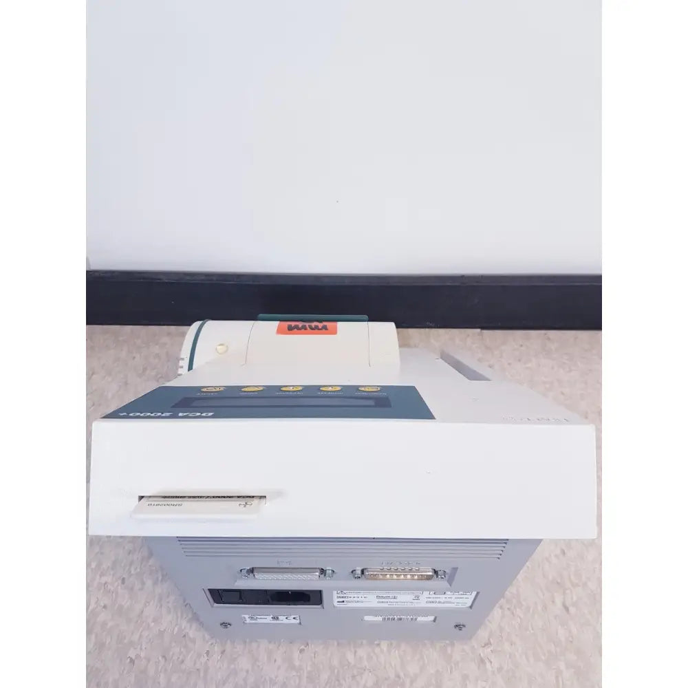 White and gray mami dca 3000 v2.0 thermal printer with teal accent and front ports for bayer dca analyzer ref reuse medical