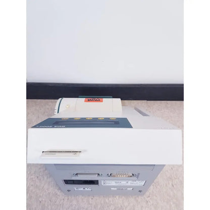 White and gray mami dca 3000 v2.0 thermal printer with teal accent and front ports for bayer dca analyzer ref reuse medical