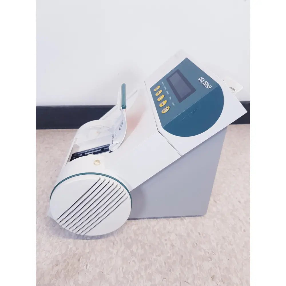 White and gray bayer dca 2000 plus analyzer ref cash counting machine with digital display yellow buttons reuse medical