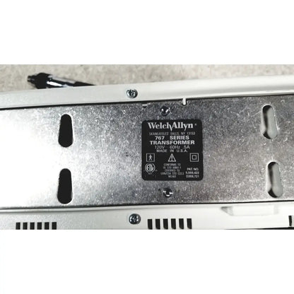 Silver metallic welch allyn 767 series transformer with black label on the back of beckman coulter airfuge ultracentrifuge 60hz 120v