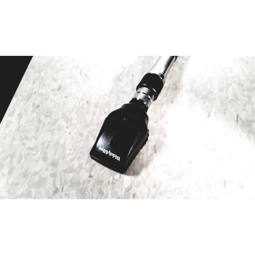 Black plastic and chrome metal otoscope with tecan branding alongside beckman coulter airfuge ultracentrifuge 60hz 120v
