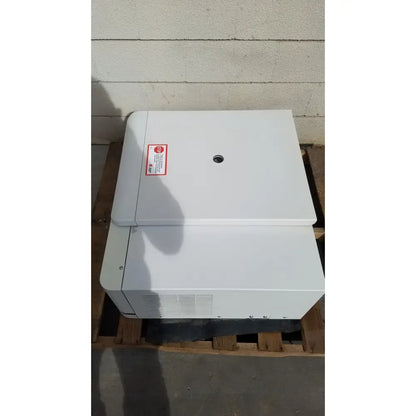 White industrial-grade beckman coulter avanti j-15r refrigerated centrifuge with red warning label and circular vent on top