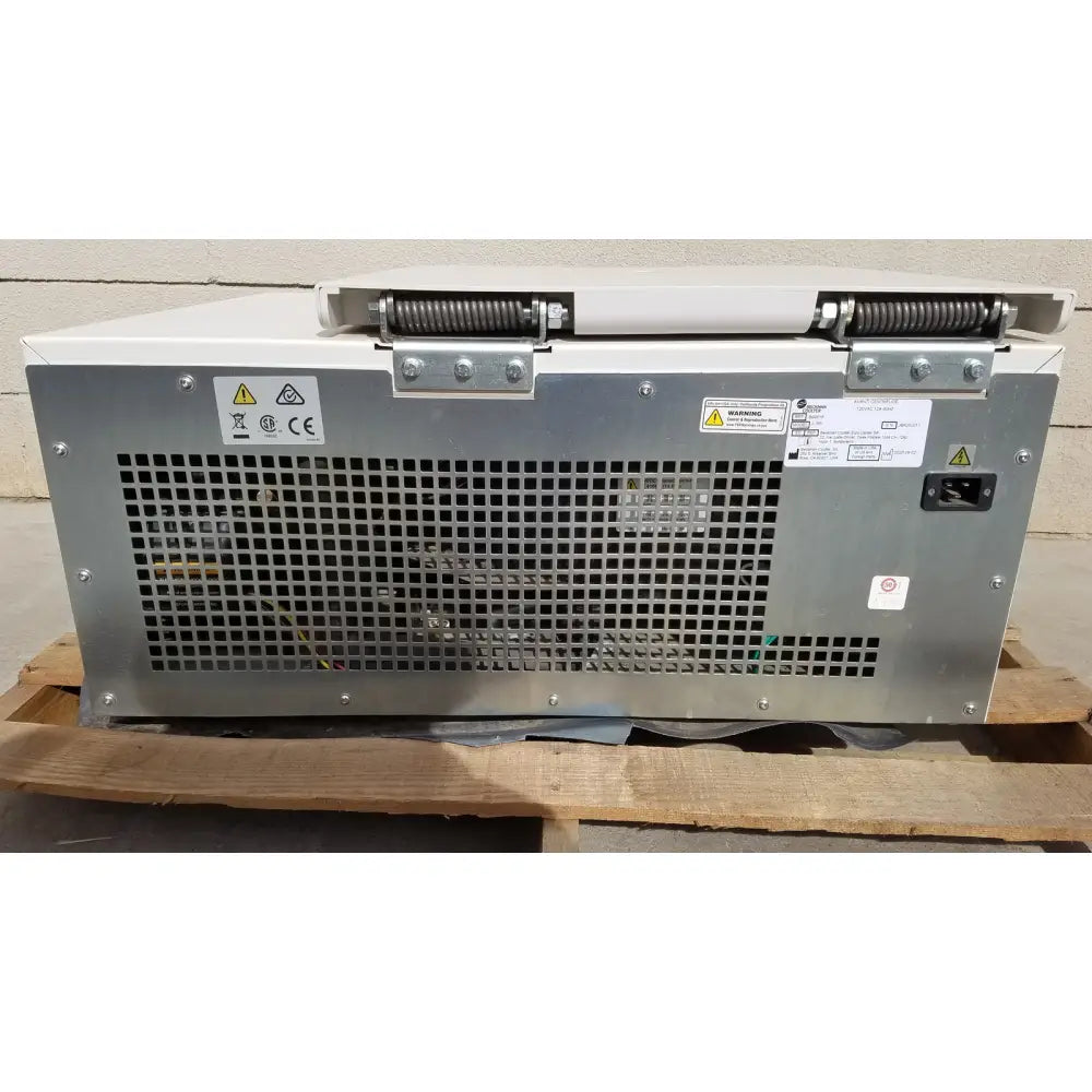Bechman coulter avanti white and gray metal refrigerated centrifuge showing perforated rear panel of the machine