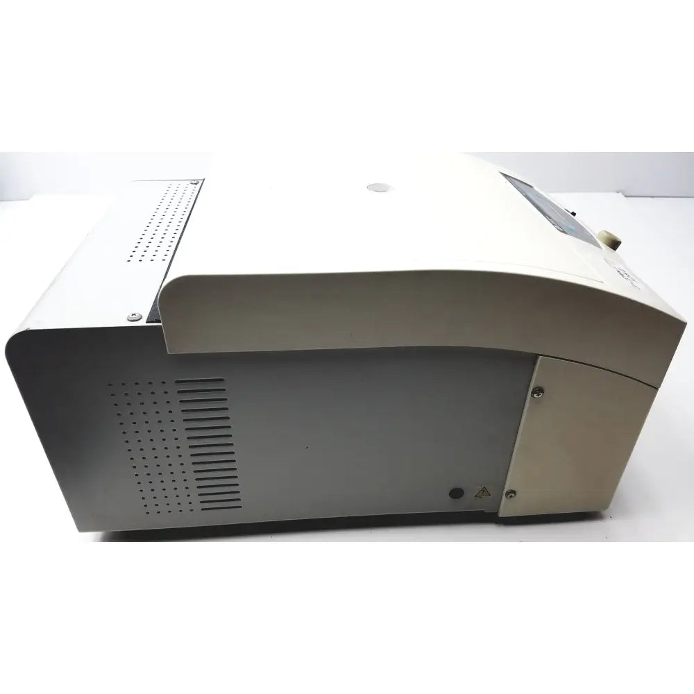 Beige and gray beckman coulter microfuge 22r centrifuge with sleek modern design and ventilation grilles on sides