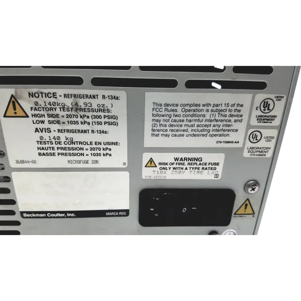 Silver metallic beckman coulter microfuge 22r centrifuge with black warning labels and certification stickers