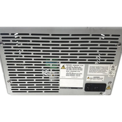 Silver metallic beckman coulter microfuge 22r server rack with perforated grille and multiple warning labels visible from back side