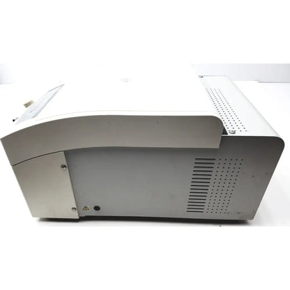 Silver-gray plastic beckman coulter microfuge 22r centrifuge with curved top and perforated ventilation panels