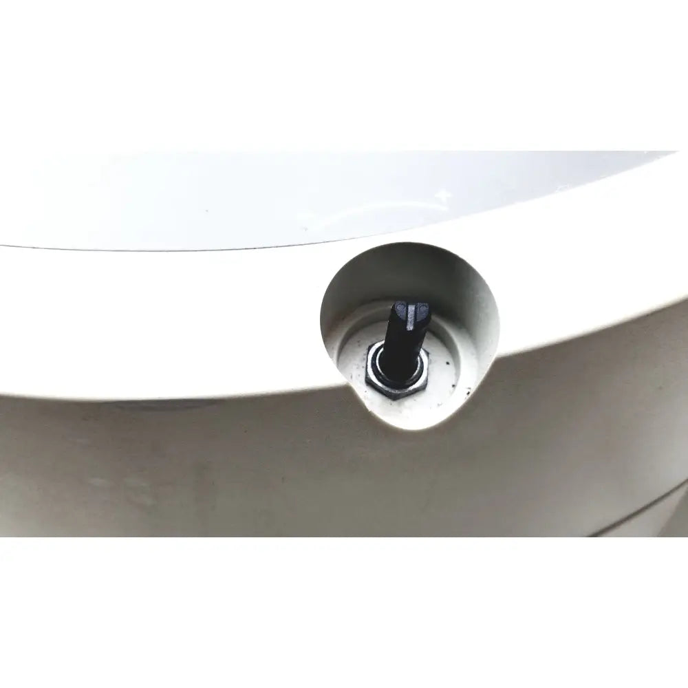 Black hexagonal bolt with textured head set into white plastic housing of beckman coulter microfuge 22r centrifuge