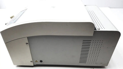 Silver-gray plastic beckman coulter microfuge 22r centrifuge with curved top and perforated ventilation panels